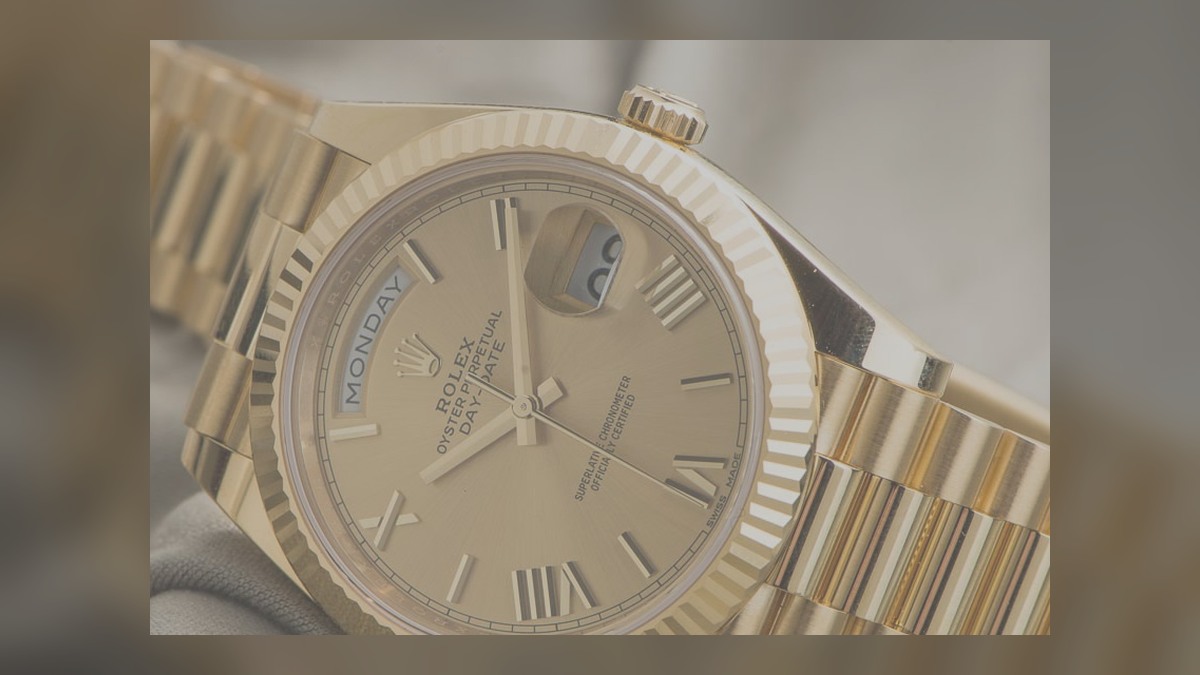 Close-up of Day-Date style weekday and date displays with Cyclops lens