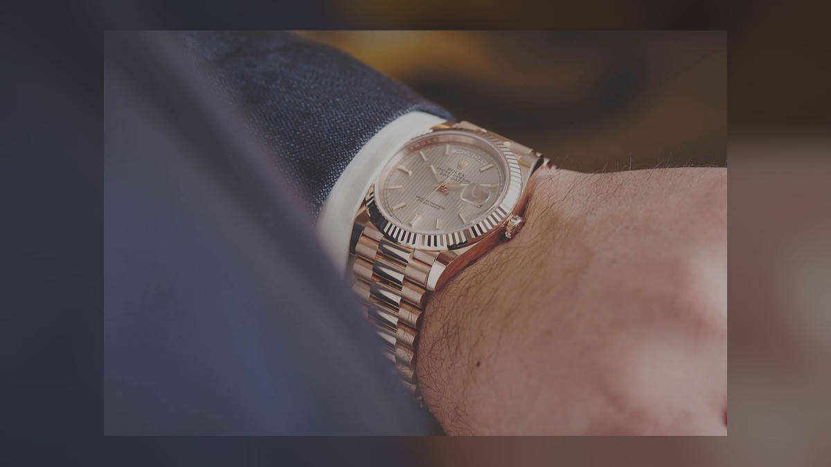 Day-Date style watch on a wrist showing case and President-style bracelet proportions
